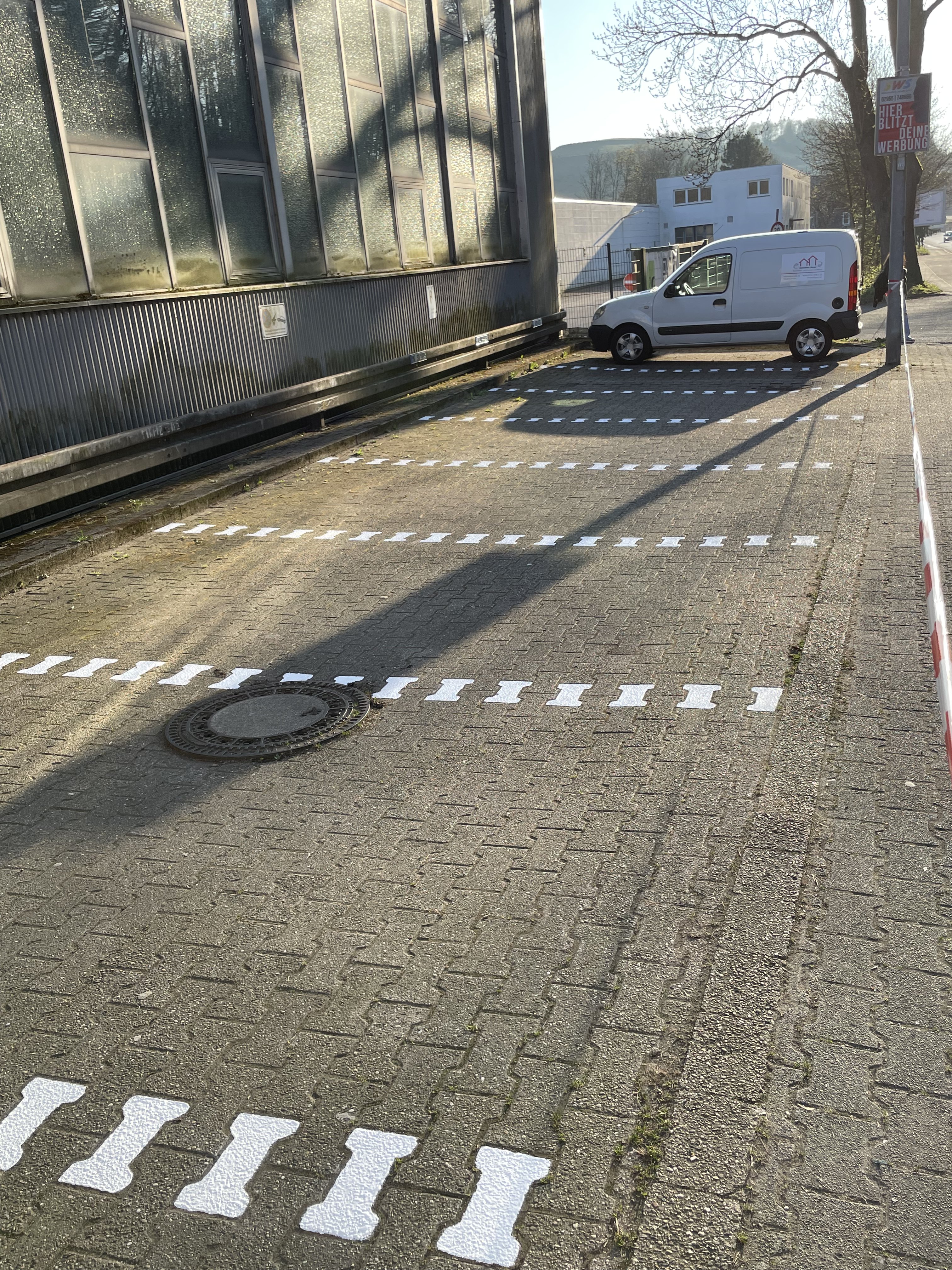 Parkplatzmarkierung Pflastersteine